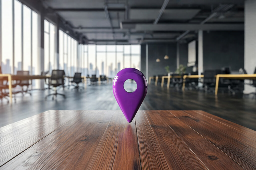 Ambiente corporativo moderno com marcador de localização sobre mesa de reunião, ilustrando como escolher endereço fiscal e endereço comercial baseado no nicho de mercado e em estratégias de expansão por polos setoriais.